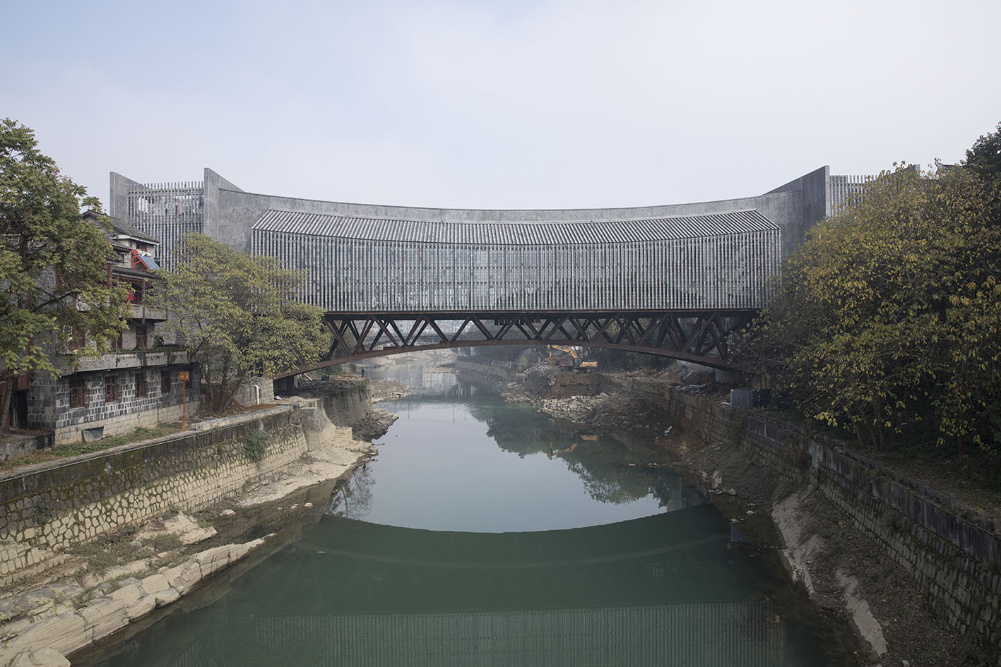 JAM_over_Wanrong_River_-_万溶江上的吉首美术馆_-__Photographer_Tian_Fangfang.1557126523380 JAM_over_Wanrong_River_-_万溶江上的吉首美术馆_-__Photographer_Tian_Fangfang.1557126523380